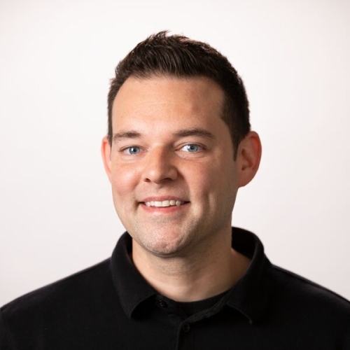 A headshot of Ph.D. candidate Frank Machos. 